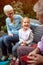 Little girl with grandparents enjoying outdoor