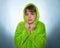 The little girl in a green robe isolated