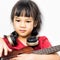 Little girl on guitar and headphone