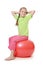 Little girl on a gymnastic ball