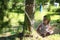 Little girl in hammock nature summer