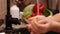 Little girl hands closeup of rinsing handful of cherry tomatos