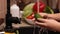 Little girl hands washing cucumber for a salad