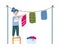 Little girl hangs up the washed laundry, cartoon vector illustration isolated.