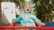 Little girl having fun on merry-go-round, she smiles and happy, real emotions