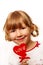 Little girl with heart shape lolly