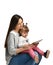 Little girl and her beautiful young mom are using a digital tablet