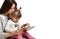 Little girl and her beautiful young mom are using a digital tablet