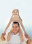 Little girl with her father having fun on beach vacation