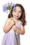 Little girl holding african lily
