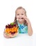 Little girl holding bowl of vegetables