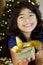 Little girl holding cash at Christmas