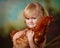 Little girl holding chicken