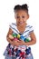 Little girl holding chocolate easter eggs