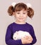 Little girl holding dwarf bunny