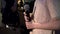 little girl holding a microphone before performing at a children's concert