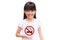 Little girl holding a no smoking sign