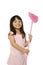 Little Girl Holding Pink Cleaning Tools