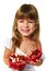 Little girl holding pomegranate