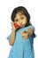 Little girl holding red wireless telephone
