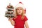 Little girl holding small decorated christmas tree