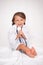 Little girl holding a stethoscope isolated with clipping path