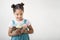 Little girl holding three ice cream cones