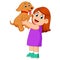 A little girl is holding up her new brown puppy with the happy face