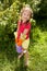 Little girl holding a watering can