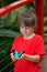 Little girl holds a Ulysses Swallowtail