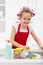 Little girl housekeeping - doing the dishes