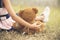 Little girl hugging a fluffy teddy bear