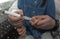 The little girl injects herself with insulin. The girl is giving an injection. World Diabetes Day.