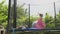 Little girl Jumping Trampoline Equipment Backyard Have Fun Summer Warm Day Caucasian Female Child Enjoy Life Active