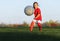 Little girl kicks soccer ball