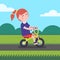 Little girl kid riding bicycle on a park bike path