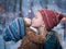 A little girl kisses a Teddy bear