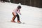Little girl learning alpine skiing