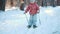 A little girl is learning cross country skiing