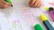 Little girl learning to write the alphabet.