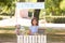 Little girl at lemonade stand in park