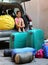 Little girl loads the car during the summer holidays