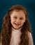 Little girl with long hair funny emotions