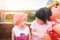 Little girl look in the eyes - Children having fun playing outside Asian kids girl sitting on a bench happy with toys in the