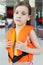 Little girl looks at camera after swimming