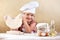 Little girl making pizza or pasta dough