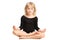 Little girl making yoga relaxing pose