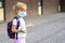 Little girl in mask during corona virus going to school or kindergarten