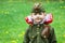 A little girl in a military uniform on Victory Day celebration in Volgograd