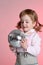 Little girl with mirror sphere